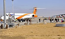 A Kam Air passenger plane at the Ahmad Shah Baba International Airport in Kandahar, Afghanistan Kam Air at Kandahar International Airport in 2012.jpg