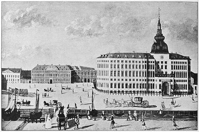 The rebuilt Copenhagen Castle about 1730 with the new Chancellery building to the left and the passageway linking the two buildings