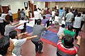 Knee Movement - Loosening Practice - International Day of Yoga Celebration - NCSM - Kolkata 2015-06-21 7312.JPG