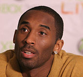Head shot of Kobe Bryant in street clothes at a press conference