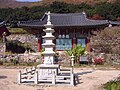 Geungnakjeon (Hall) is in the style of the last years of the Joseon period (1392-1910). The temple, however, dates from the Three Kingdoms period (57B.C.-A.D.668) when it was built as a branch of Songgwangsa Temple. It is said to have been burnt down during the 1597 Japanese Invasion and to have been reconstructed in 1604. Geungnakjeon has a hipped-and-gabled roof with eaves of the roof supported by clusters of brackets. This multi-bracketing is typical of late-Joseon architecture. Records show that the building was either repaired or rebuilt in 1846, the 12th year of the reign of Joseon's King Heonjong(1849-63). Tangible Cultural Properties 102 (Goheung-gun) Geumtapsa is at the base of Mount Cheondeungsan in Goheung county originally dates to the 7th century. One of the more prominent featuers is Natural Monument no. 239, the nutmeg forest that surrounds the temple.