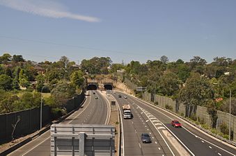 Western portal of the Epping Tunnel on the M2 Hills Motorway as seen from the train. This view is before the start of widening works.