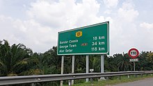 Signage along the North-South Expressway near Butterworth. Malaysia E1 highway sign.jpg