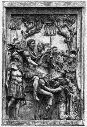 Marcus Aurelius přijímá podrobení poražených Markomanů se vztyčenými vexilly. Reliéf pochází ze zaniklého oblouku Marka Aurelia v Římě. Nyní umístěný v Kapitolských muzeích.
