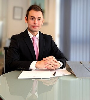 Minister for Business and Employment, the Honourable Neil F Costa MP.jpg