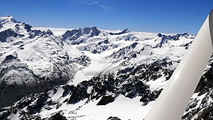 Murchison Glacier with Broderick Peak (2669 m) and Mount Manering (2669 m) in the center