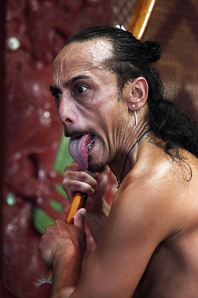 When performed by men, haka feature protruding of the tongue.