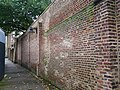 The nineteenth-century wall around the former churchyard of Church of St George the Martyr in Borough. [103]