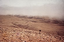 The view from Akoot, in the Jebel Qara, at the start of the khareef (monsoon) season Oman. Dhofar 1972 (8626144207).jpg