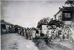 The opening of the short-lived Woosung Road, the first railway in China, between Shanghai and Wusong in 1876. OpeningDay.jpg
