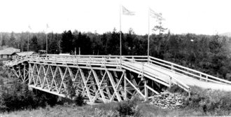 The original bridge over the Pigeon River was known as The Outlaw. Outlaw Bridge.png