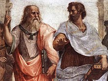 Detail from the Renaissance painting The School of Athens portraying two bearded men, Plato and Aristotle