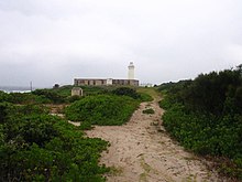 Approach to the Lighthouse showing the keepers' house and other structures.