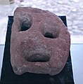 Red stone artifact, with possible ritual use, found at the Yukunitsa archeological site