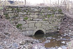 The historic Schuylkill Canal aqueduct carries the trail over Crossman's Run near Oaks Schuylkill Canal Oaks Viaduct, January 2008.jpg