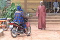 Street Scene with Woman on Motorbike - Bobo-Dioulasso - Burkina Faso.jpg