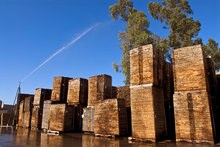 Oak seasoning at the Toneleria Nacional wood yard Toneleria-nacional-wood-yard.png