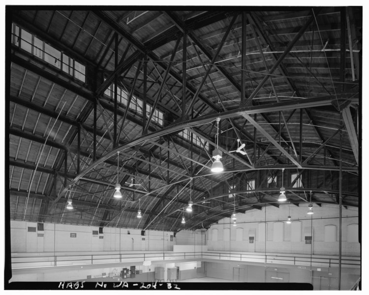 File:VIEW OF ROOF TRUSSES FROM SOUTHEAST CORNER OF BALCONY LOOKING NORTHWEST. SHOWS WINDOWS ON WEST MONITOR, WINDOWS IN THE NORTH WALL OF THE DRILL HALL AND STAIRWAY AT THE NORTHWEST HABS WASH,39-YAK,2-32.tif