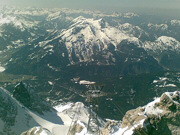 View from mountain Zugspitze to Daniel and to some of the Mountains of Ammergau Alps