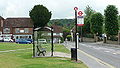 English: Bus stop A on Vicarage Hill, Westerham, Kent, at Westerham Green. These are Transport for London bus stops, as TfL route 246 serves them, and TfL selfishly take over in this situation. It also serves routes 236, and 401. Unlike stop B opposite, this stop states seperate "towards" points, so the information is correct for all the routes. However, the "alighting point only for buses terminating here" regards only the 246 so is rather misleading.