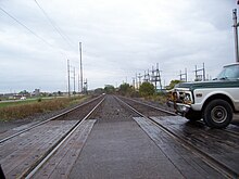 Looking east at the site of the derailment from Mill St. WeyauwegaWisconsinTrainTracksWIS110MillStOctober2008.jpg