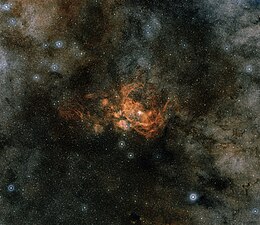 Wide-field view of the area of NGC 6357 in constellation Scorpius.jpg