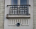 Balcon en fer forgé de l'hôtel de style Art Nouveau "Suisse et Bordeaux" à Grenoble.