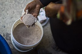 The seaweed farmers learned how to make soap from their seaweed at the Zanzibar Seaweed Center, a business that started as an NGO in 2009. At their homes, they mix water, ground seaweed powder, coconut oil, caustic soda and essential oils in a large plastic tub.