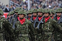Japan Ground Self-Defense Force soldiers, wearing red ascots