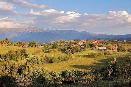 Piatra Craiului mountains and village of Măgura, location of multiple accommodation options