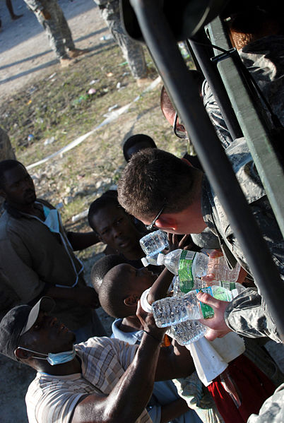 File:2-319th, Black Falcons, Deliver Much Needed Food and Water in Port-au-Prince DVIDS246882.jpg
