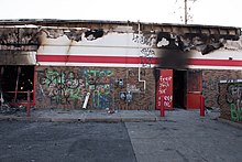 Wreckage of an AutoZone store in Minneapolis, May 28, 2020. 20200528- DSC7417 (49947789571).jpg