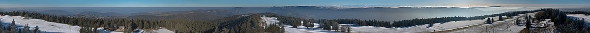Panoramic view from the Tour de Moron over the jura Mountains up to the Alps