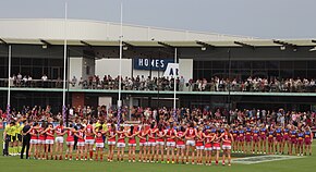 The teams lined up for the national anthem AFLW S7 GF teams line up.jpg