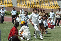 A game of Kho-Kho in progress at the Sports meet for Parliamentarians and Media Persons, in New Delhi on August 30, 2005 (1).jpg