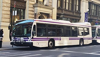A bus system transports students to and from the far ends of campus. AcademyBus2145NYU.jpg