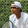 Akgul Amanmuradova competing in the first round of the 2015 Wimbledon Qualifying Tournament at the Bank of England Sports Grounds in Roehampton, England. The winners of three rounds of competition qualify for the main draw of Wimbledon the following week.