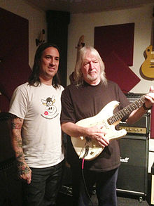 In June 2013, Jesse Amoroso and Seymour Duncan authenticate a guitar once owned by Jimi Hendrix. Amoroso Duncan Jimi Strat.jpg