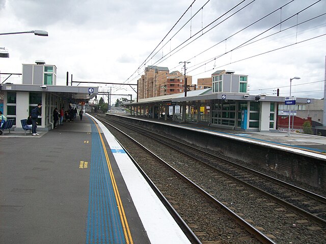 Westbound view from Platform 3 showing shelters and buildings, January 2008