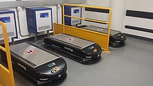 Automated Guided Vehicles charging in the hospital's basement level Automated Guided Vehicles.jpg