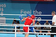 Deutsch: Boxen bei den Olympischen Jugendspielen 2018 Tag 12, 18. Oktober 2018 - Finale Leichtgewicht Mädchen – Oriana Saputo (Argentinien, blau) schlägt Emma Lawson (Australien, rot) 5-0; Ringrichter ist José Romero (Spanien). English: Boxing at the 2018 Summer Youth Olympics on 18 October 2018 – Girls' lightweight Bronze Medal Bout – Oriana Saputo (Argentina, blue) wins over Emma Lawson (Australie, red) 5-0; Referee is José Romero (Spain). Español: Boxeo en los Juegos Olímpicos Juveniles de Verano de 2018 en 18 de octubre de 2018 - Combate de medalla de bronce de las niñas: Oriana Saputo (Argentina, azul) gana a Emma Lawson (Australie, roja) 5-0; Árbitro es José Romero (España).