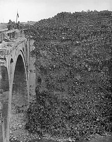 Brig-Gen J. V. Campbell on Riqueval Bridge addresses men of 137th Brigade after breaking the German's Hindenburg Line defences on 29 September 1918 British 137th Brigade.jpg