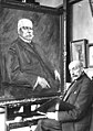 1927, infront of his portrait of Paul von Hindenburg