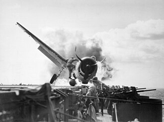 VF-2 Grumman F6F-3 Hellcat crash-lands aboard USS Enterprise, 10 November 1943 Burning Grumman F6F-3 Hellcat of VF-2 aboard USS Enterprise (CV-6) on 10 November 1943 (80-G-205473).jpg