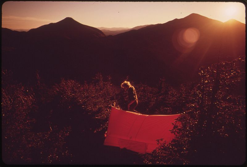 File:CAMPING AT 4,000 FEET ON TOP OF MOUNT PHELPS AS THE SUN SETS OVER ALGONQUIN MOUNTAIN AND WRIGHTS PEAK, IN THE... - NARA - 554674.jpg