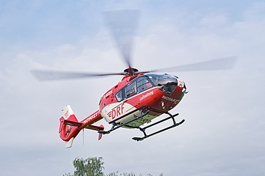 English: Deutsche Rettungsflugwacht (DRF) Eurocopter EC135 P2 "Christoph 44" Air Ambulance Helicopter (reg. D-HDRK, s/n 0477) during takeoff in Göttingen, Germany. Christoph 44 is called through PSAP Göttingen and stationed at the university hospital of Georg-August-University of Göttingen. Deutsch: Deutsche Rettungsflugwacht (DRF) Eurocopter EC135 P2 "Christoph 44" Rettungshubschrauber (Reg. D-HDRK, s/n 0477) beim Start in Göttingen. Christoph 44 wird über die Einsatzleitstelle Göttingen angefordert und ist am Universitätsklinikum der Georg-August-Universität Göttingen stationiert.