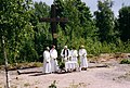 Divine service in the ruins of the Muolaa church 30 Jun 2002.jpg