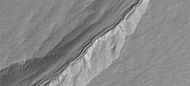 Close-up of gullies showing polygons, as seen by HiRISE under HiWish program. Polygons usually form in frozen ice-rich ground. Note: this is an enlargement of a previous image.