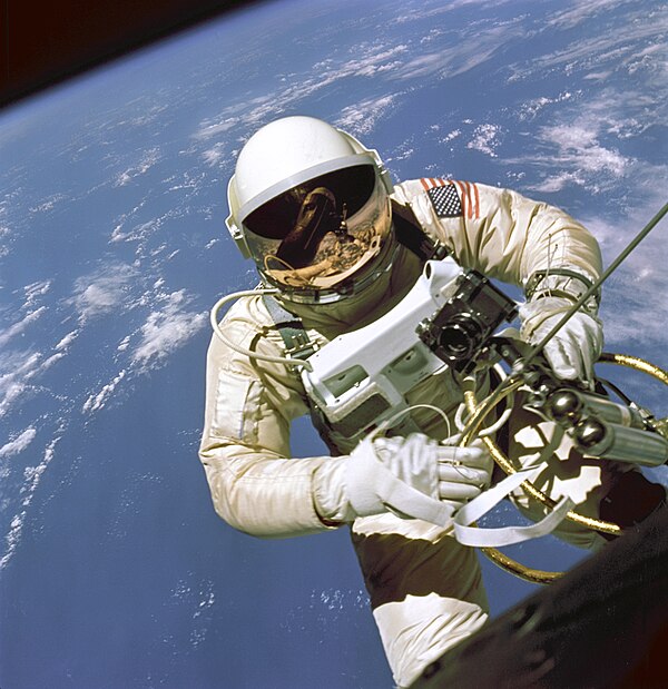 Ed White performs the first American spacewalk during Gemini IV.