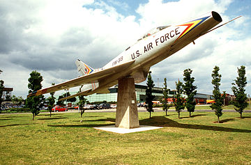 The F-100 is displayed on a permanent stand. It was the second aircraft to represent the Liberty Wing. It flew for the 48th Fighter Wing between 1956 and 1972 before it was replaced by the F-4 Phantom.